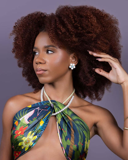 Laguna de Oviedo scarf styled as a top in a vertical editorial portrait