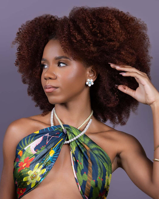 Laguna de Oviedo scarf styled as a top in a vertical editorial portrait