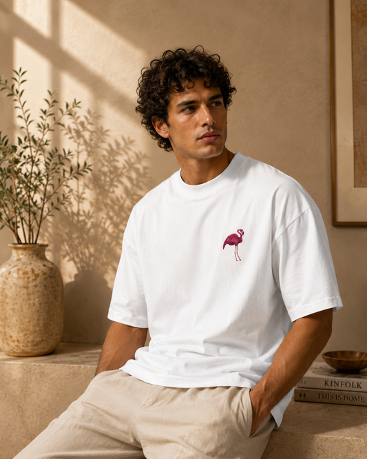 Pedernales Flamingo oversized T-shirt in a vertical editorial portrait