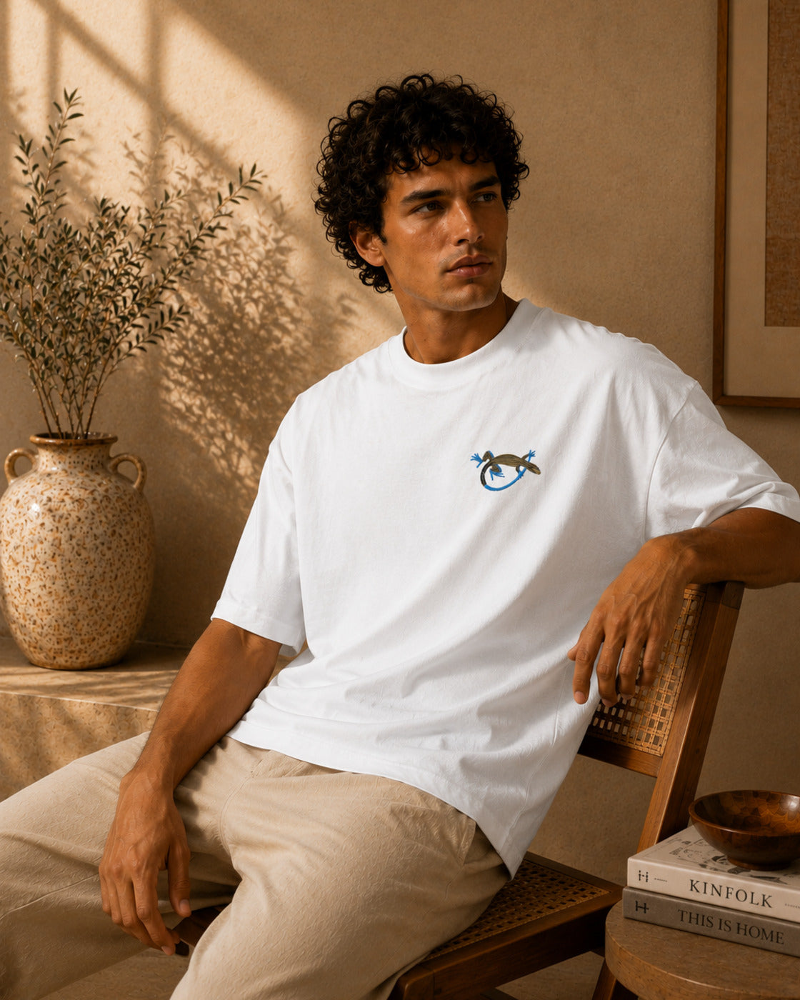 Pedernales pygmy lizard oversized T-shirt in a vertical editorial portrait