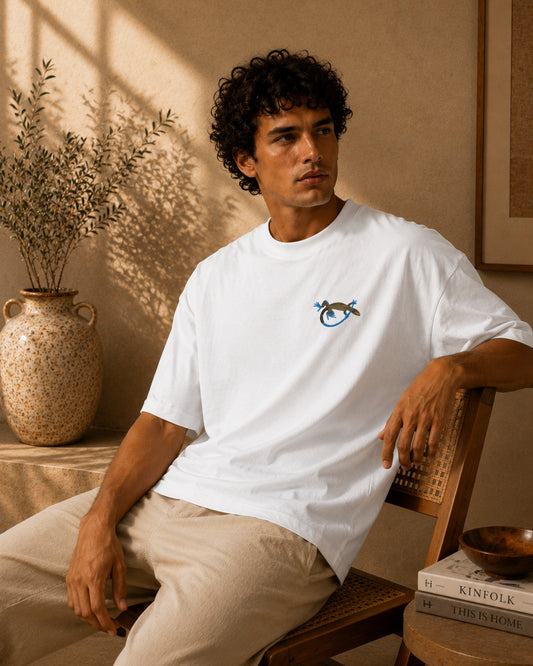 Pedernales pygmy lizard oversized T-shirt in a vertical editorial portrait